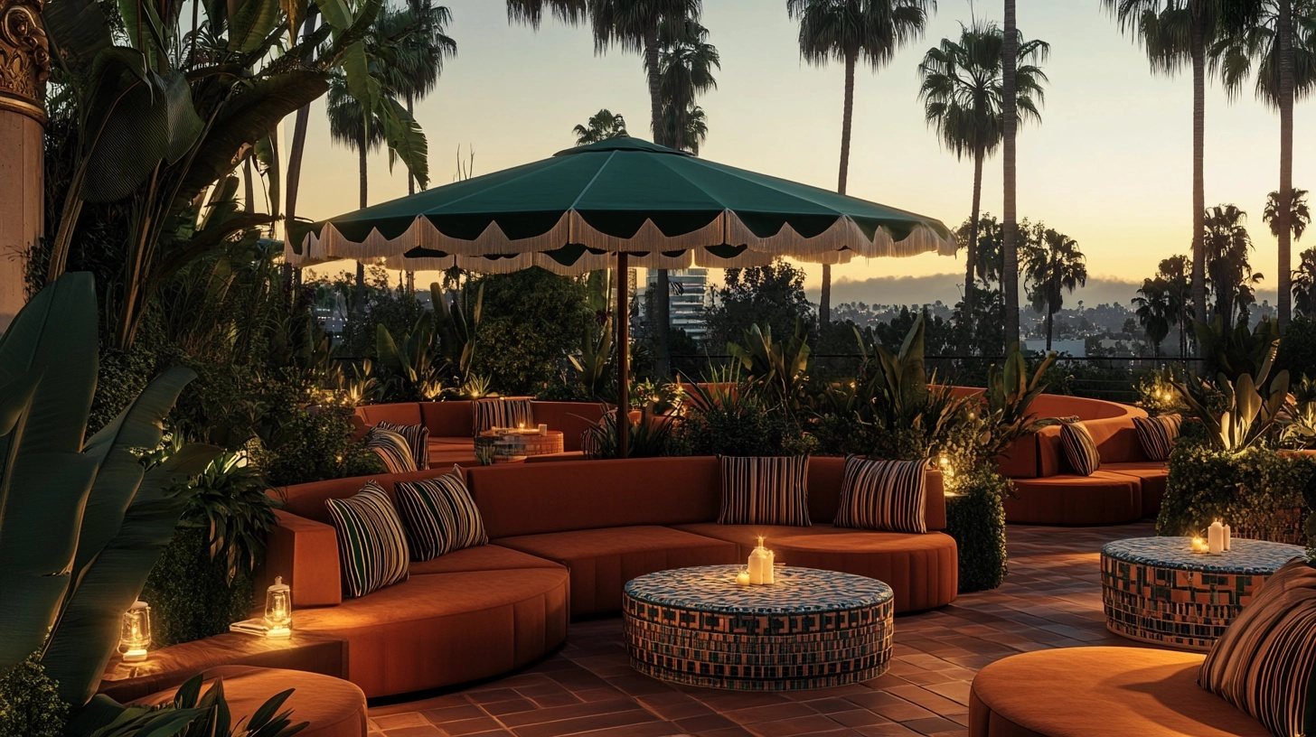 Sunset over the rooftop lounge, palms and umbrellas